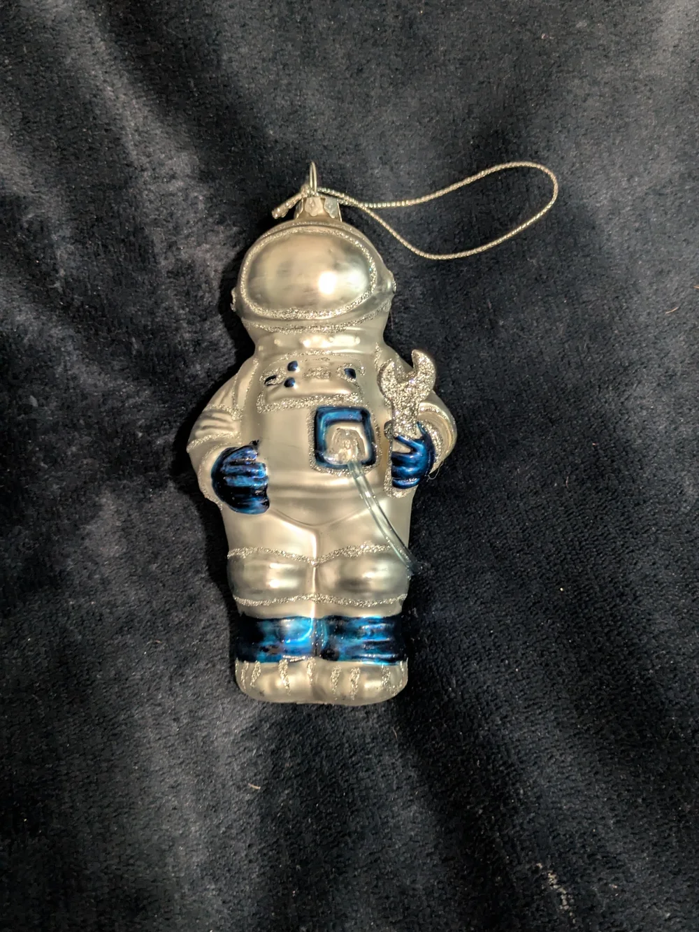 Silver and Blue Astronaut Ornament Holiday Glass Ornament